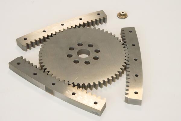 Gears made of through-hardened material (62 HRC), gear segments.